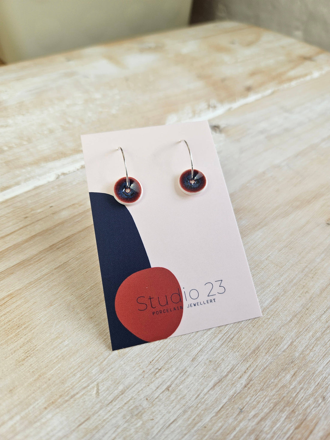 Studio 23 Curved Drop Earring Pair Burgundy/Navy