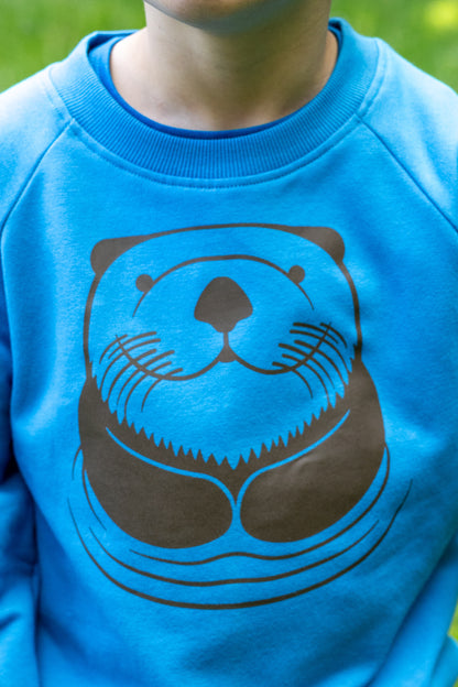 Skøn blå sweatshirt til børn med print af havodder
