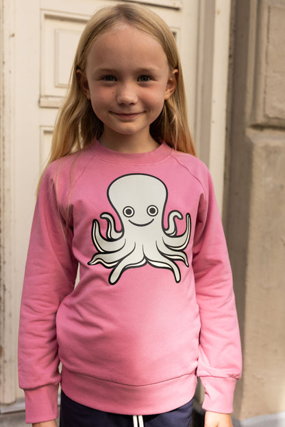 Skøn lyserød sweatshirt til børn med print af blæksprutte