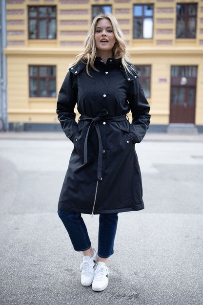 Regnfrakke til dame. Vinter regn frakke med foer.